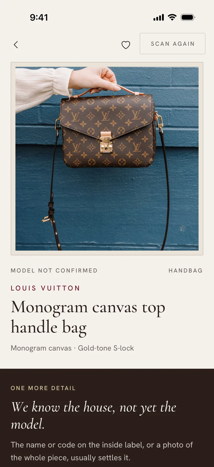 A result that says Model not confirmed: Louis Vuitton, a monogram canvas top handle bag, and a band asking for one more detail.